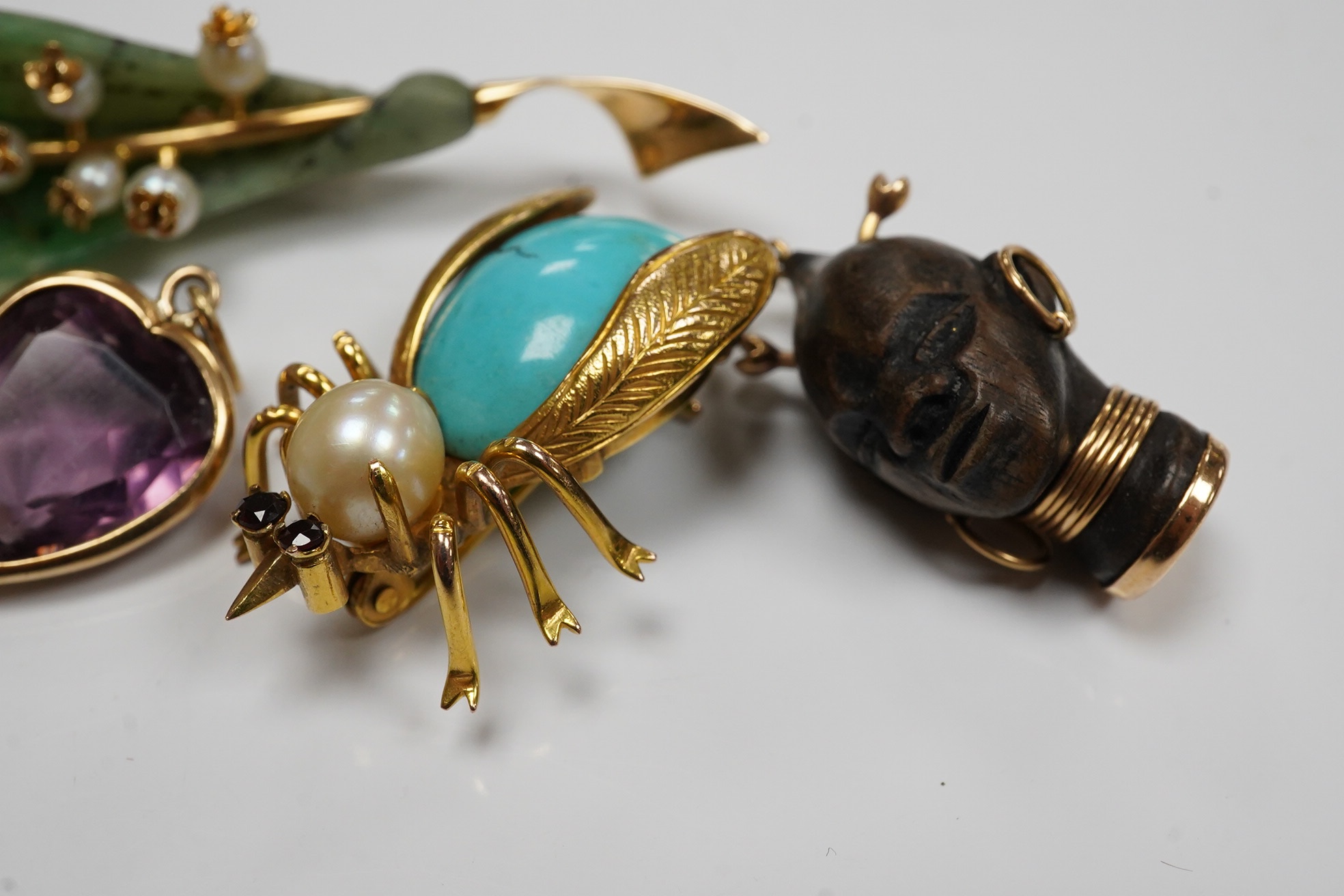 Assorted jewellery including gold plated serpent brooch, an 18k bust charm, 14k, turquoise and cultured pearl set bug brooch, etc. Condition - fair to good